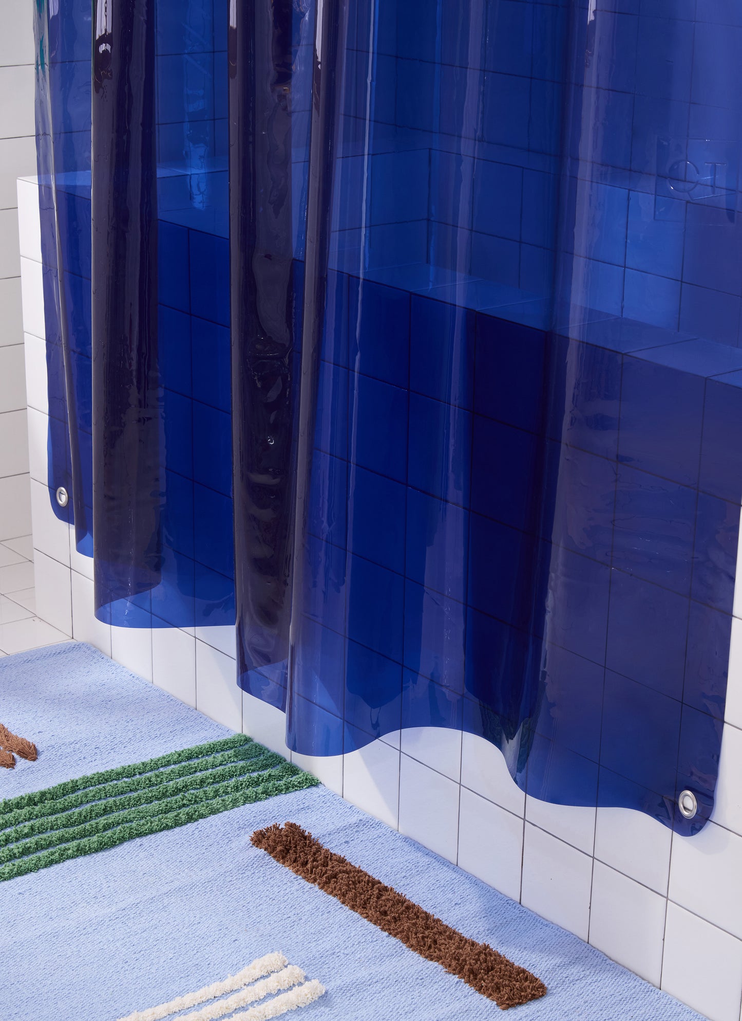 Bottom portion of Sun Shower Navy hanging above Reyes atlantic rug.