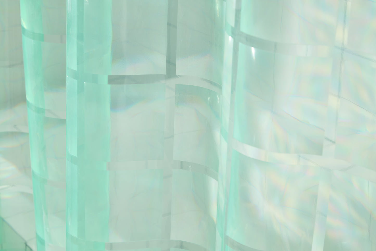 photo of mint sun shower material with embossed grout lines to show glass brick style. 