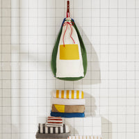 Re:Canvas Laundry Bag Pine Hanging on bathroom wall