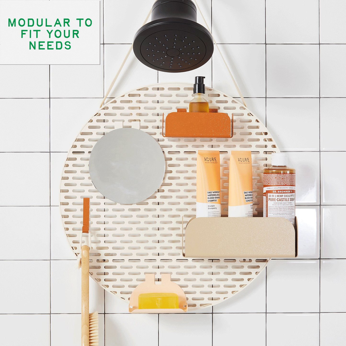 GIF of The Spot in "sand" hanging from a black shower head on a white tiled wall with the baskets and components swapping placement to show modularity. 
