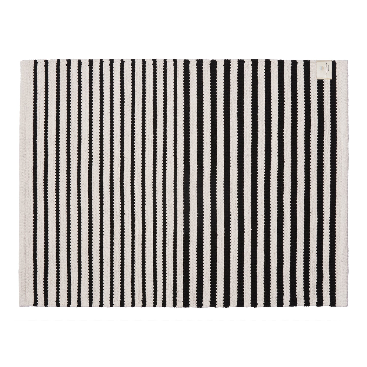 Black and white striped rug on a white background