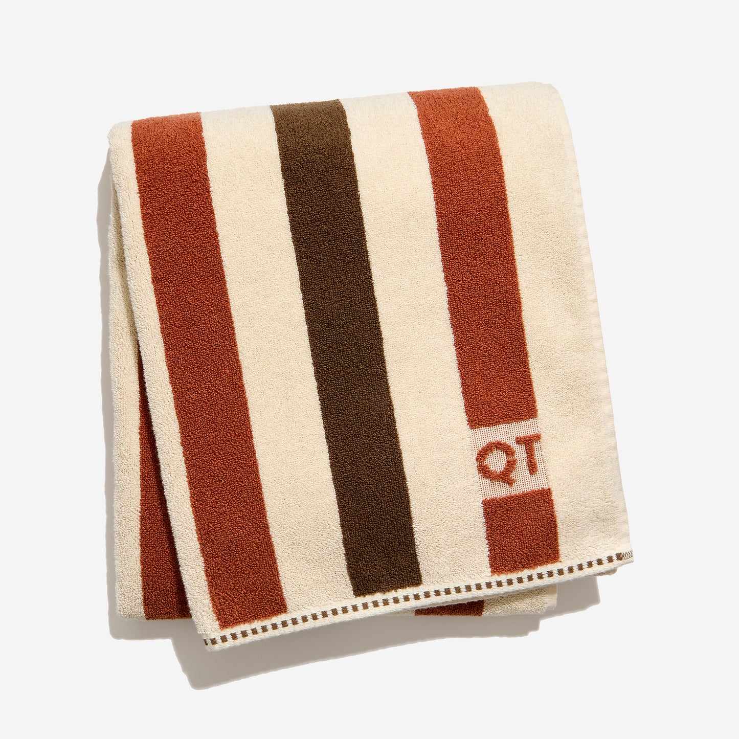 Catalina bath sheet in chocolate folded against a white background. 