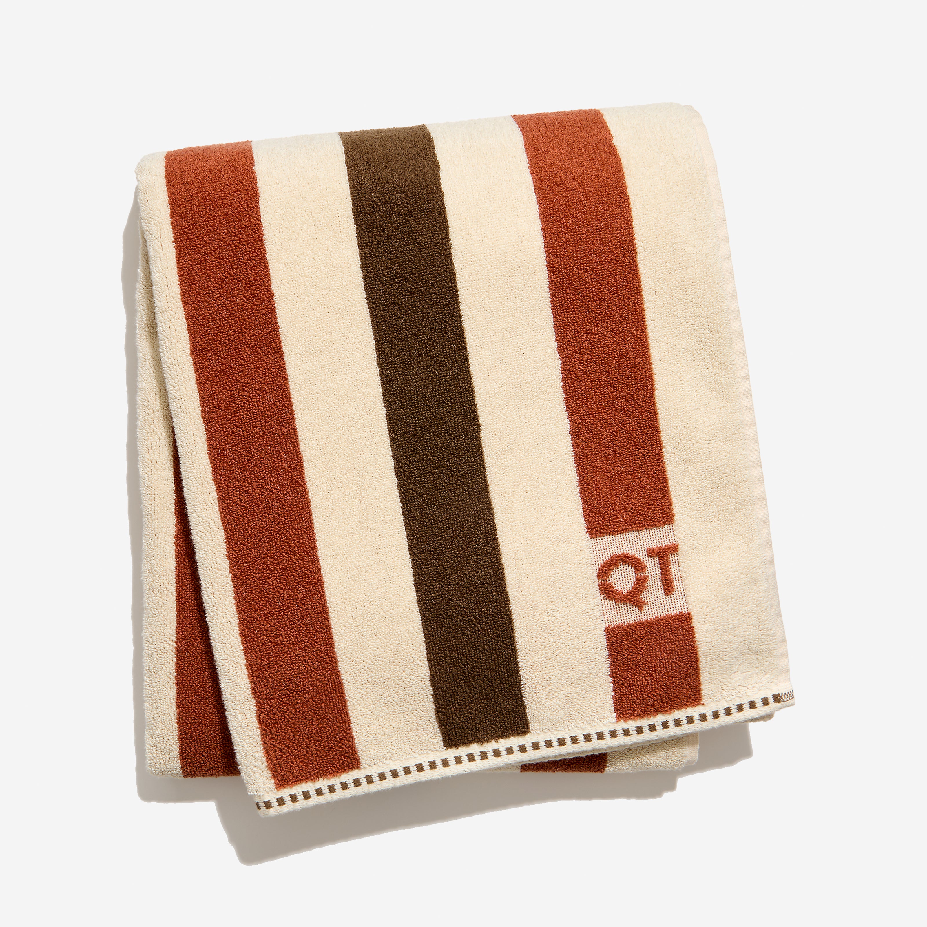Catalina bath sheet in chocolate folded against a white background. 