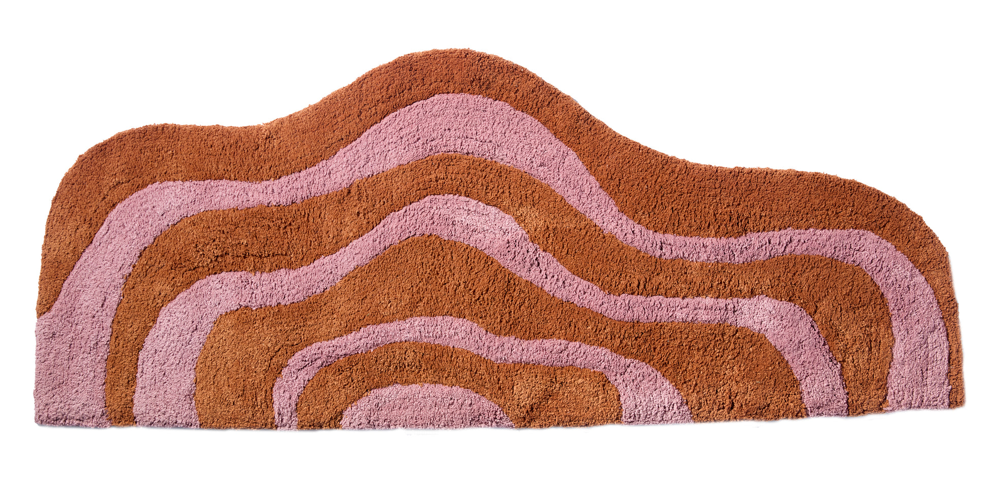 Wave shaped honey and rose striped bath mat runner in 56"x22" size with white background. 