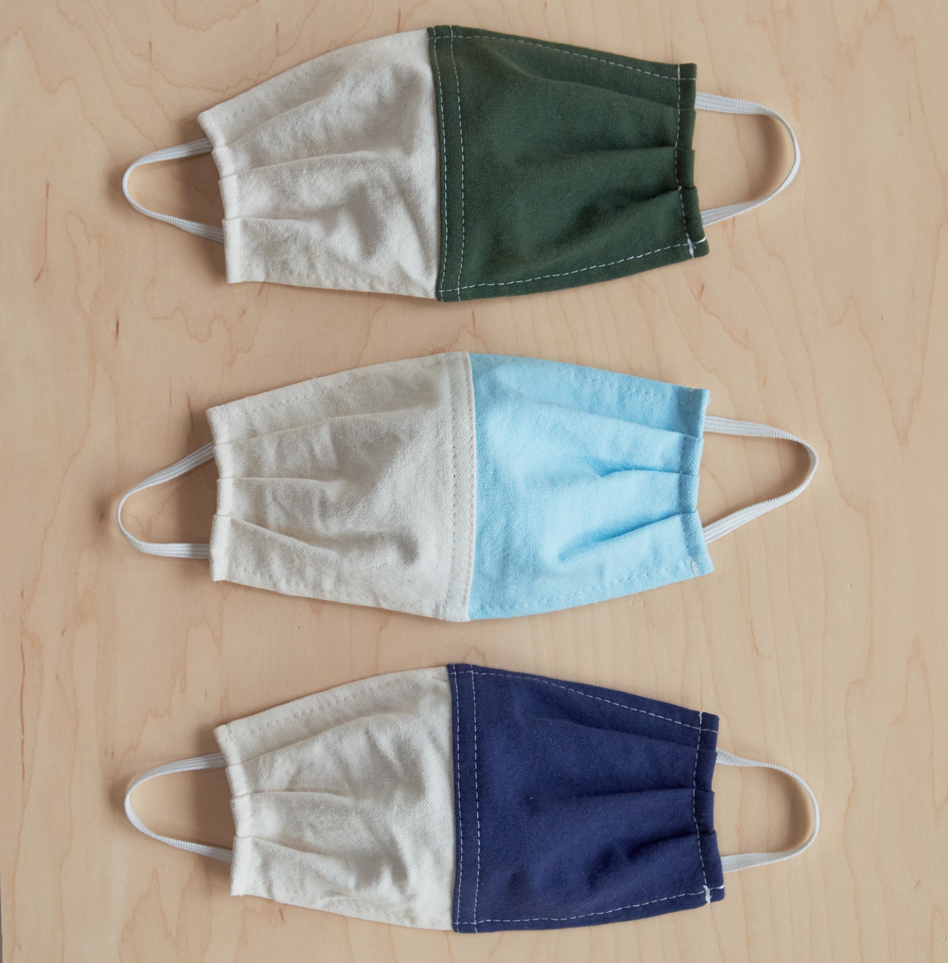 Pine Adult Masks flat on floor