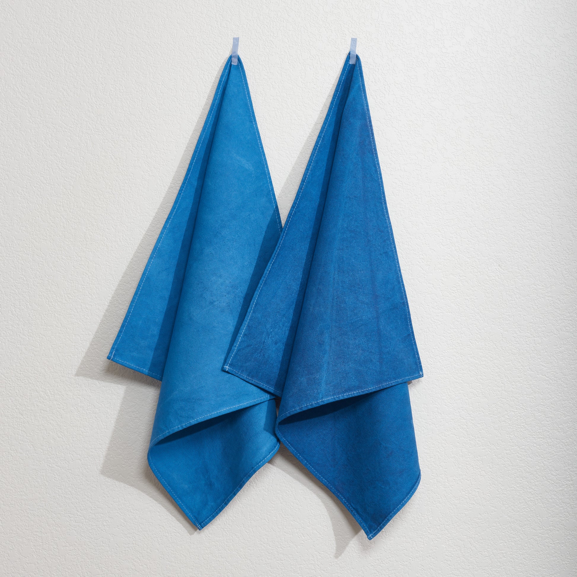 Naturally Dyed Napkins in Indigo hanging on wall