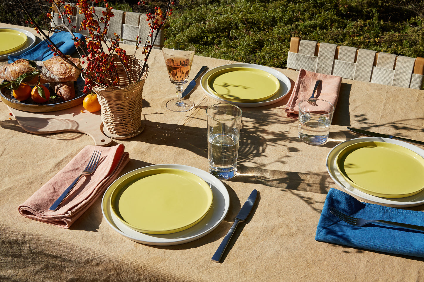 Naturally Dyed Tablecloth for 8 in Eucalyptus detail view with table arrangement