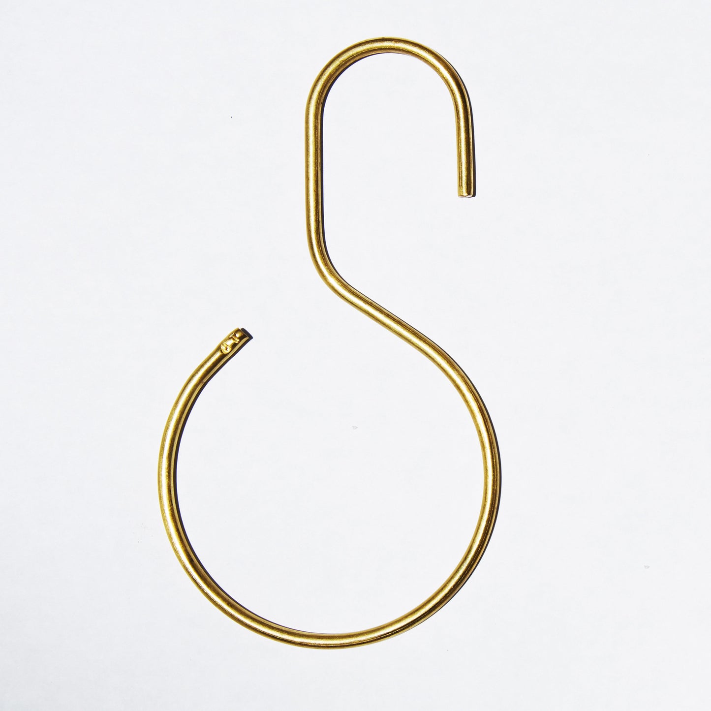 S-Hook Brass flat on floor