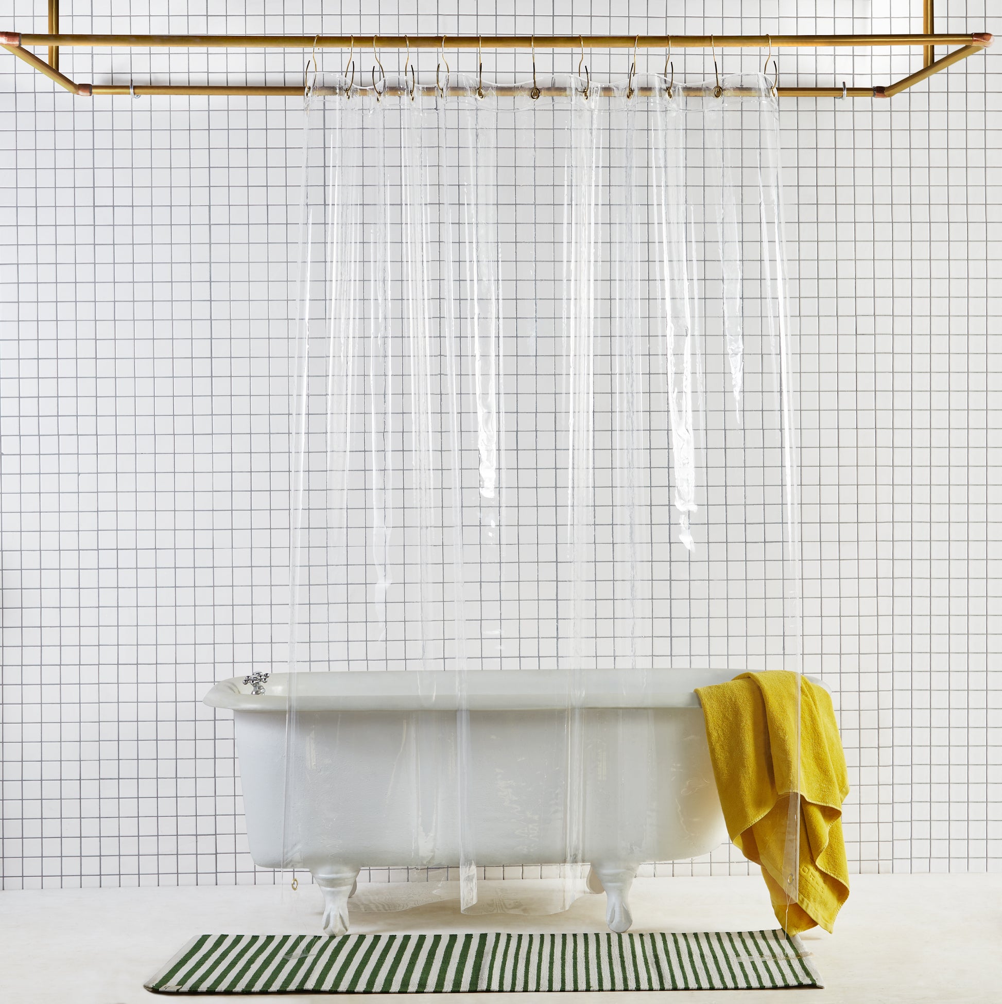 Sun Shower Air front view of curtain hanging in a bathroom.