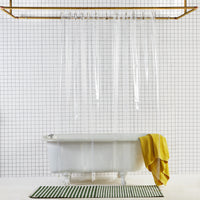 Sun Shower Air front view of curtain hanging in a bathroom.
